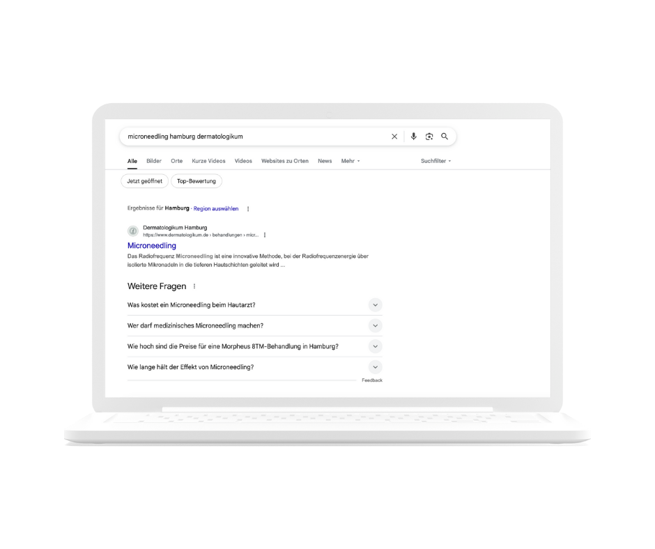 Ein schwebender Laptom mit Google Suchergebnisseite auf dem Screen